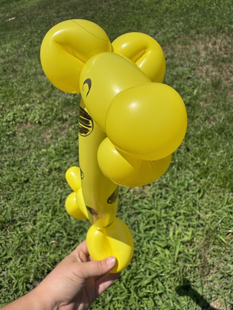 Close-up balloon giraffe face at a kids party in Texas