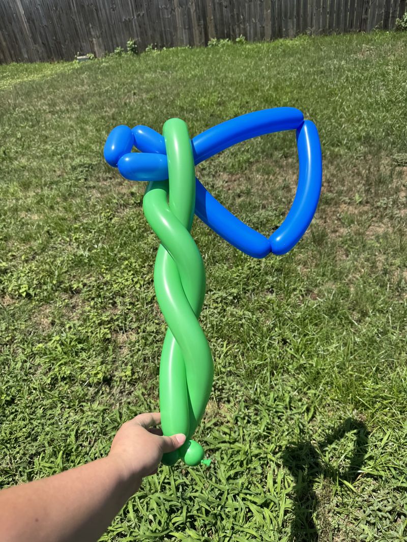 Blue and green balloon dragonfly for party entertainment in Texas