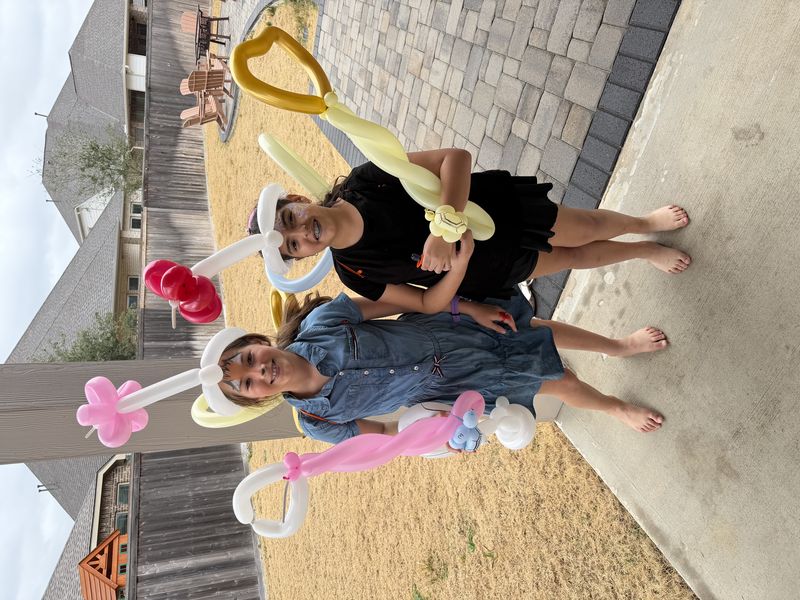 Balloon flower crown wand at a girls birthday party in Texas