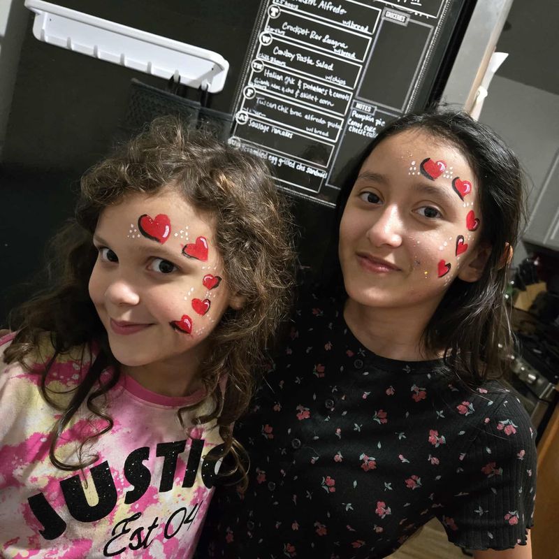 Heart face painting design at a girls party in Texas