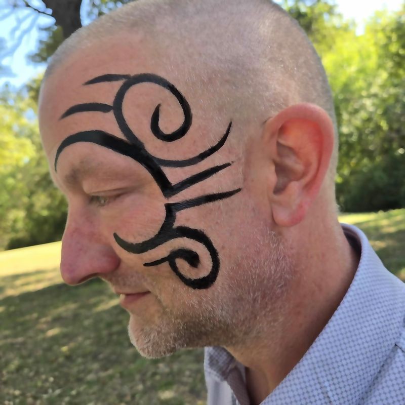 Tribal face painting for adult party entertainment in Texas